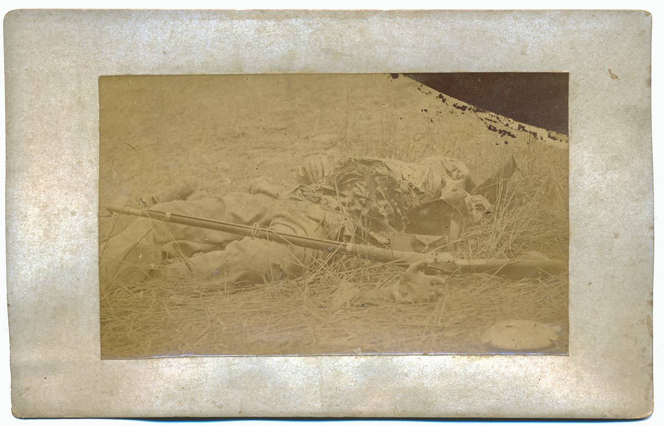 SCARCE GETTYSBURG ALBUMEN IMAGE OF MUTILATED BODY – DEAD CONFEDERATE SOLDIER IN ROSE FARM PASTURE