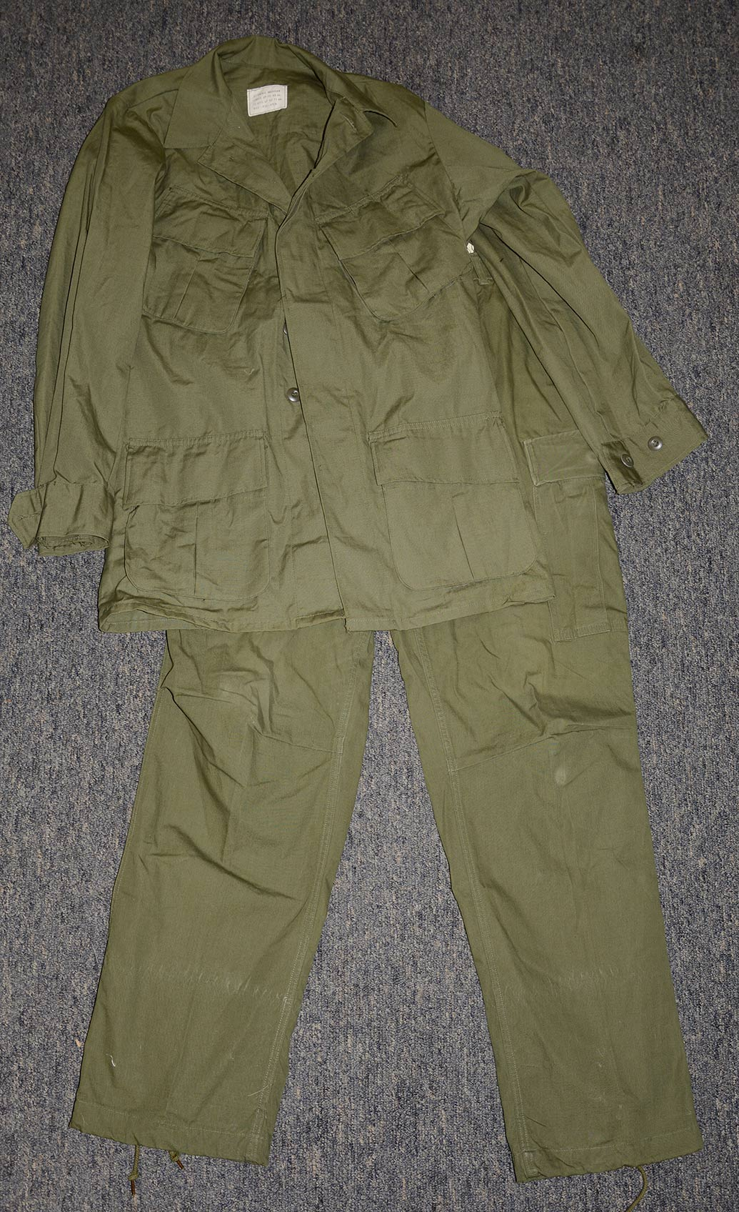 SET OF VIETNAM JUNGLE FATIGUES DATED 1967 & 1971