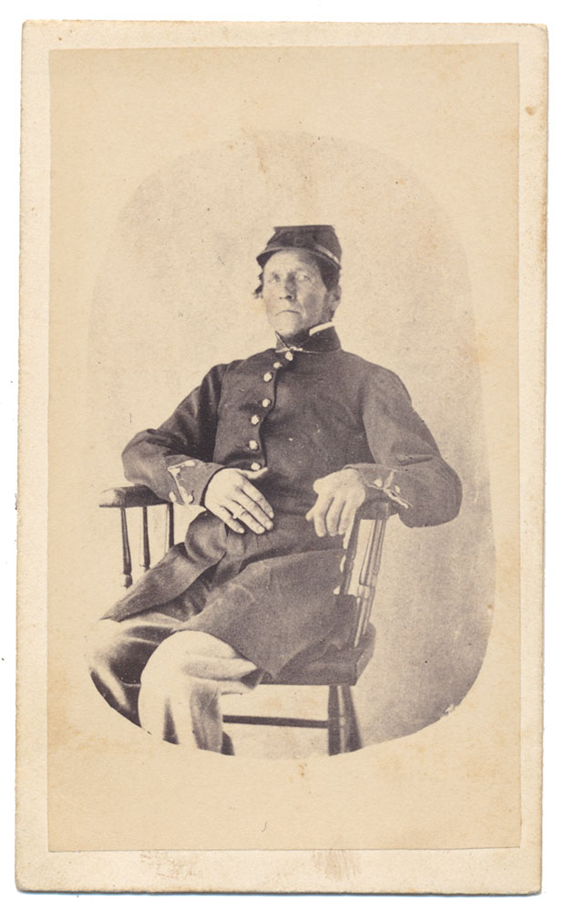 SEATED VIEW OF STERN LOOKING NEW HAMPSHIRE SOLDIER
