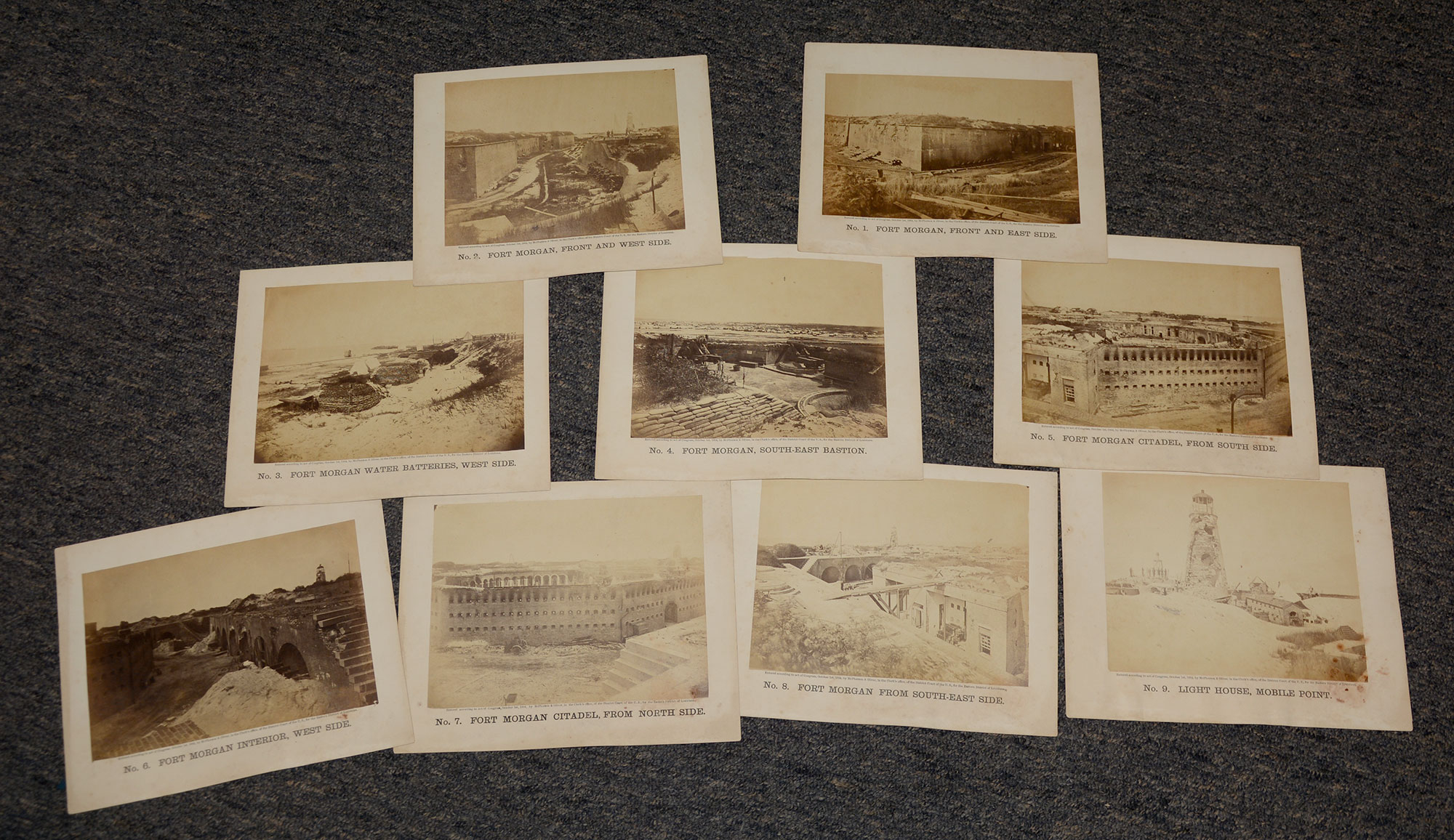 RARE COLLECTION OF NINE ALBUMEN PHOTOS OF FORT MORGAN IN 1864