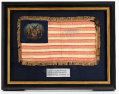 SACK COAT, CAP, SWORD, RUBBER BLANKET, MARYLAND CAMP FLAG AND OTHER EFFECTS OF LIEUTENANT AND CAPTAIN CHARLES N. KUHN, WOUNDED IN ACTION AT CEDAR CREEK WHILE BRIGADE ACTING AIDE-DE-CAMP AT CEDAR CREEK 